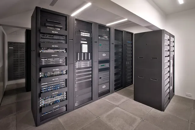 Equipment room with racks of audio and video gear